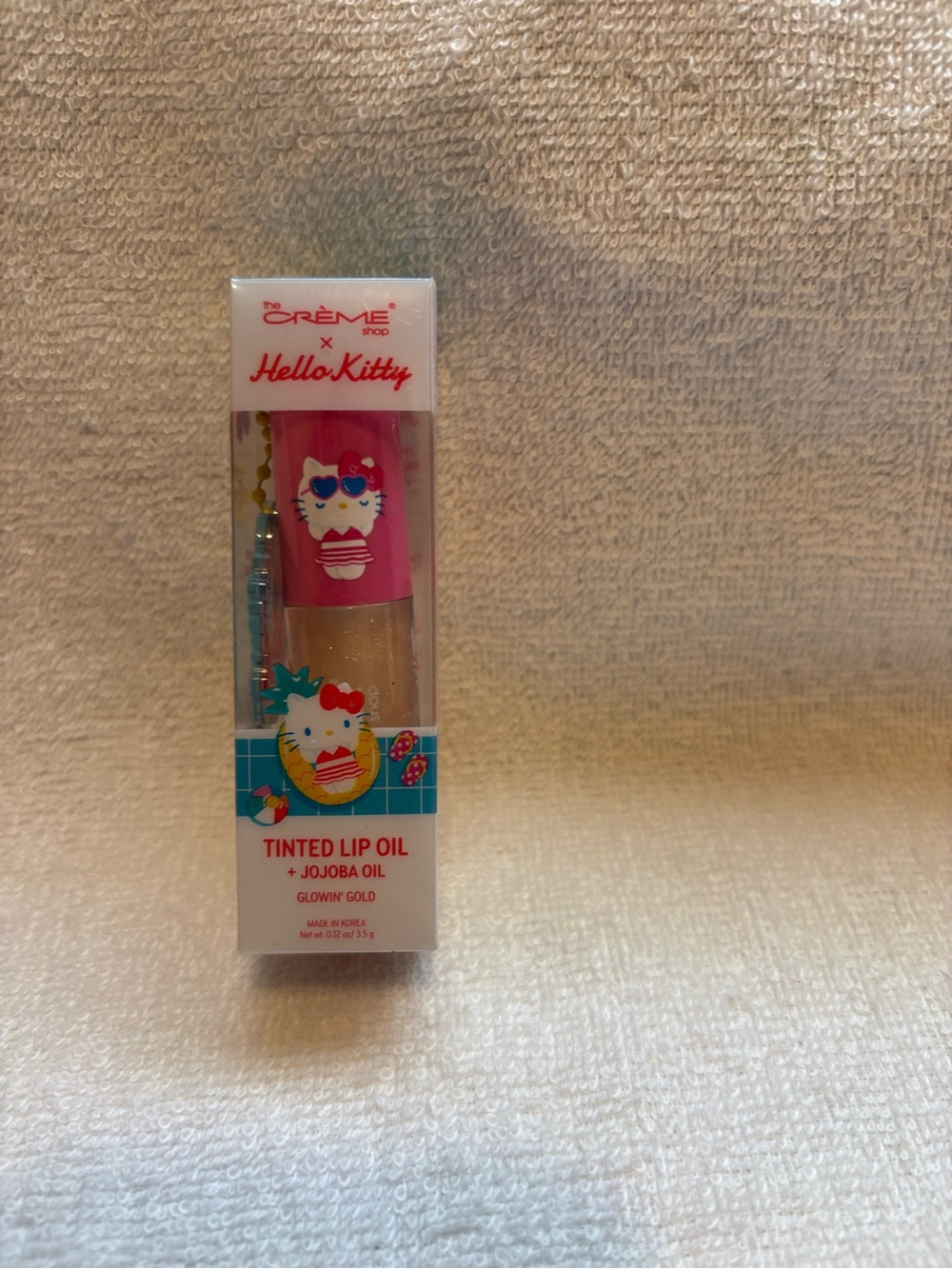 Hello kitty Glowing Gold Tinted Lip Oil - Pink